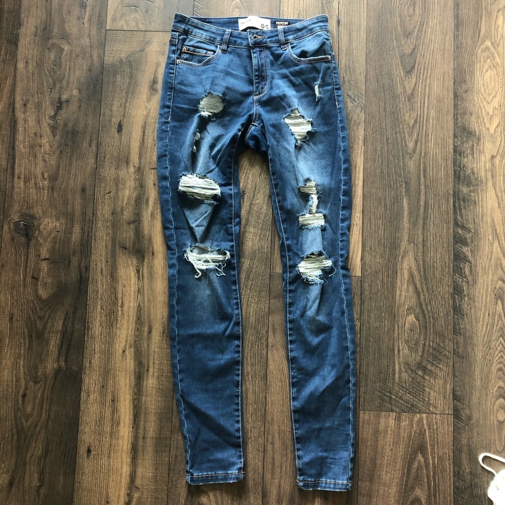 Mid-rise distressed Skinny Jeans (The Garage)